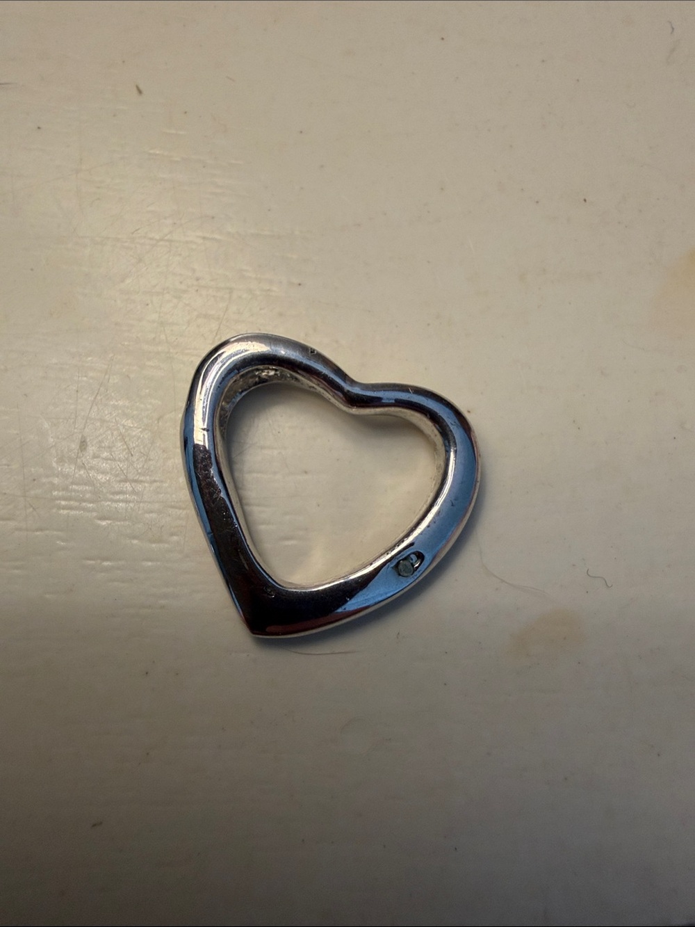 Sterling silver heart pendant 
With tiny diamond